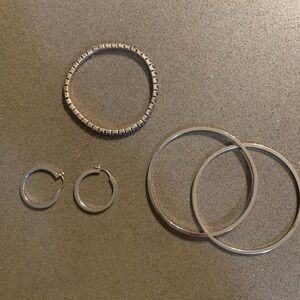 Swarovski Crystal jewelry set, includes 3 bracelets and one set of hoop earrings